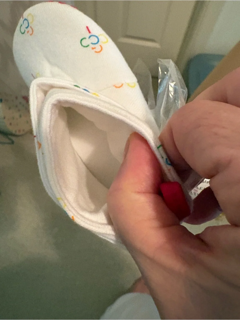 COOGI White Baby Crib Shoes with Multicolor Accent Prints